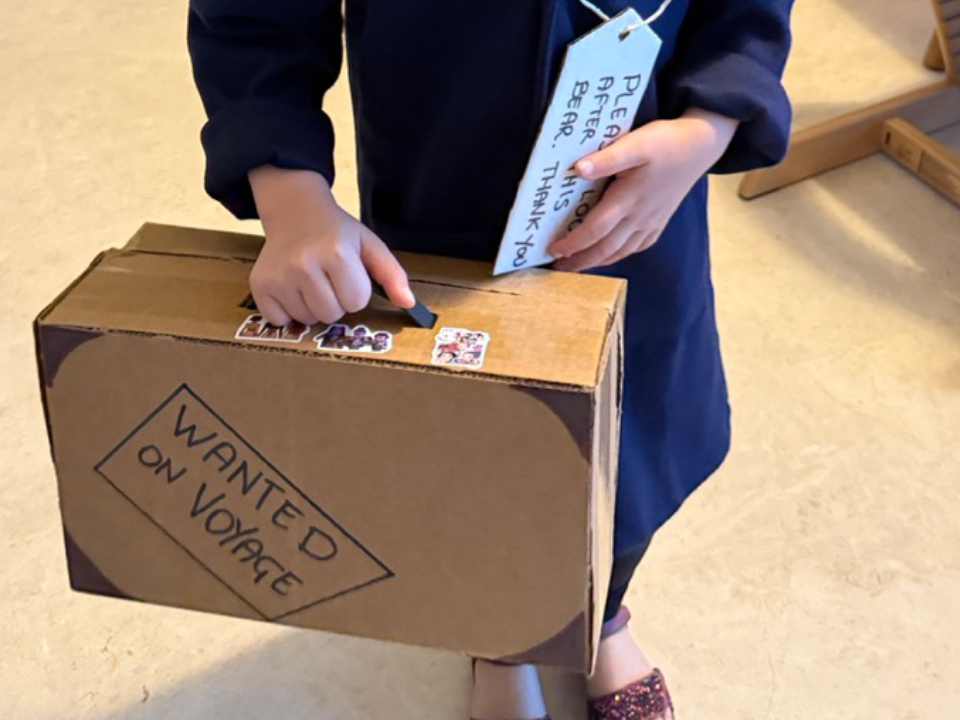 My daughter with the finished Paddington suitcase